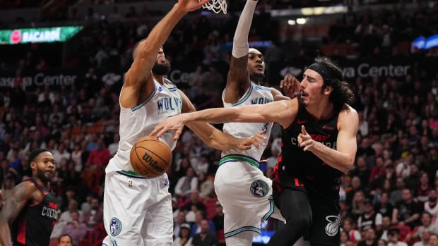 Jamie Jaquez Jr. tries to pass around Wolves